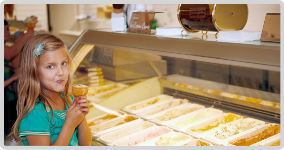 Girl eating ice cream at Cheshire Farm Ice Cream centre